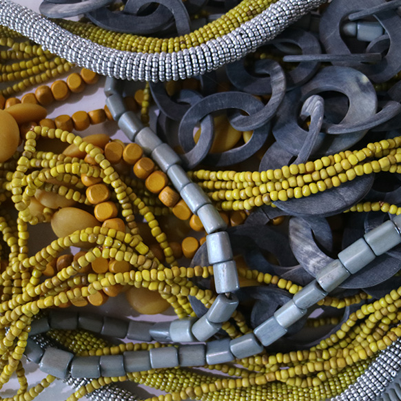 Close-up of assorted colorful beads and decorative elements.