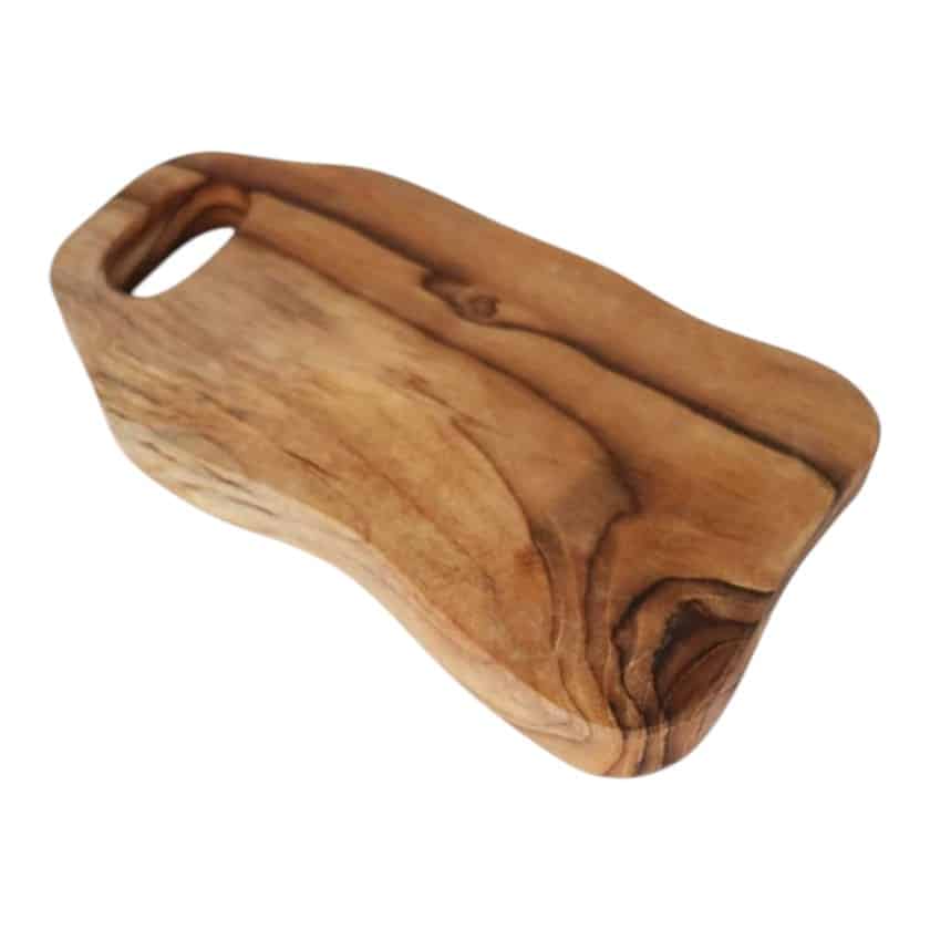 Wavy teak wood cutting board with handle, ideal for serving crostini and appetizers.
