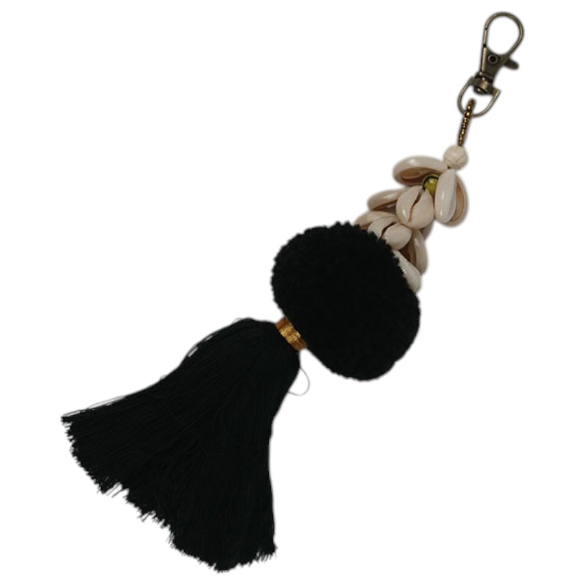Black pom pom keychain with cowrie shells and metal clip.