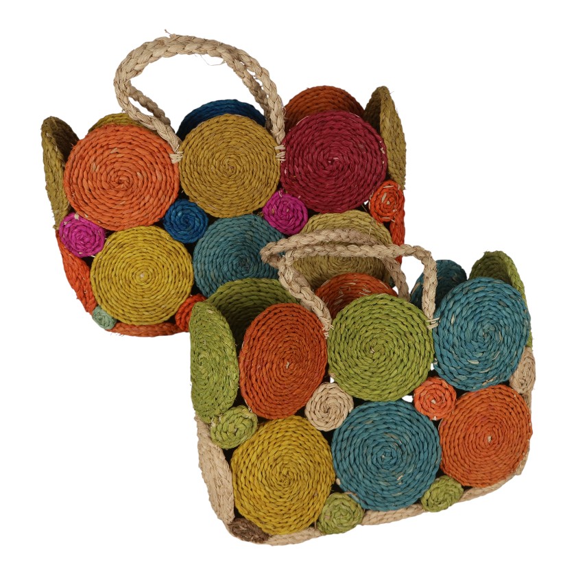 Colorful raffia makeup bag with multi-colored circular patterns and woven handles.